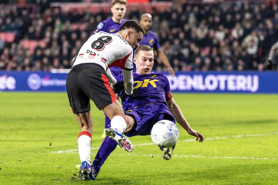 NAC Breda captain Boy Kemper tackles PSV full-back Sergino Dest NAC Breda captain Boy Kemper tackles PSV full-back Sergino Dest