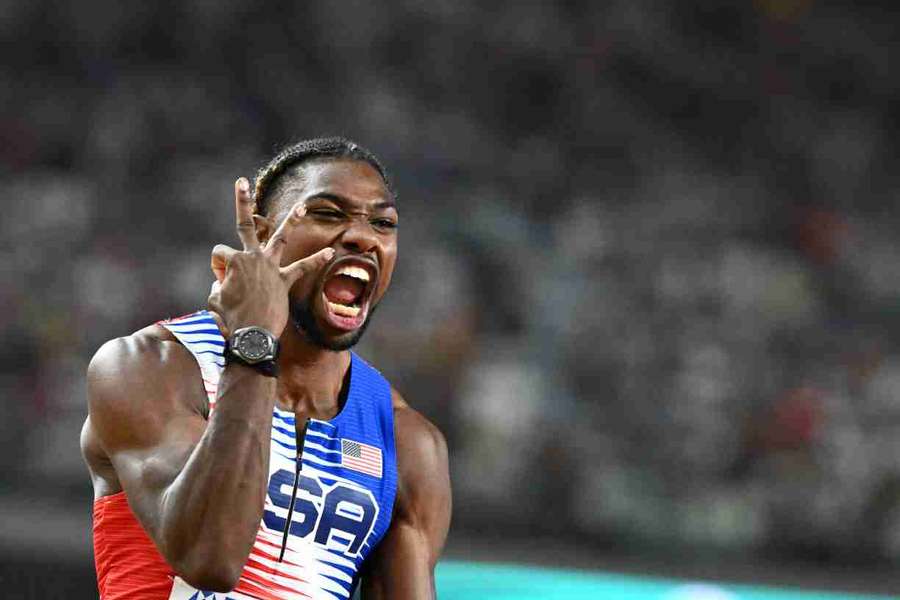 Noah Lyles celebrates after crossing the line to win the 4x100m relay for USA Noah Lyles celebrates after crossing the line to win the 4x100m relay for USA