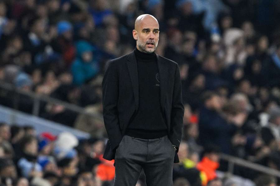 Guardiola reacts on the touchline