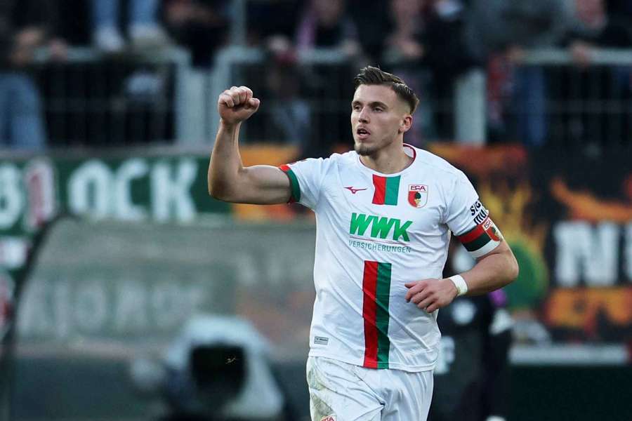 Ermedin Demirovic in action for Augsburg