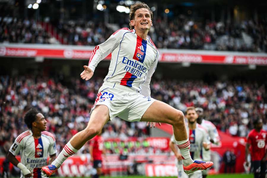 Lyon's Tyler Morton celebrates his first goal for the club