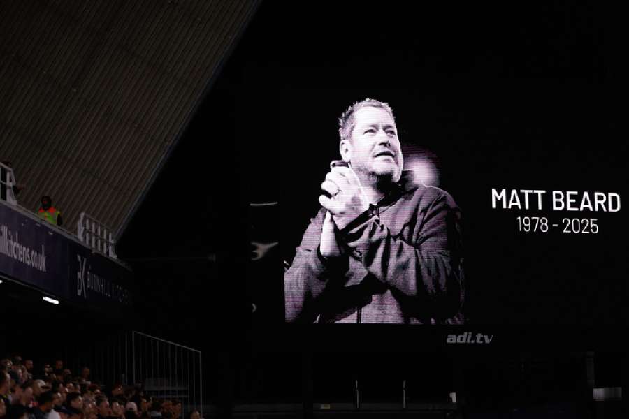 A tribute to former Liverpool Women manager Matt Beard is pictured inside Millwall Stadium
