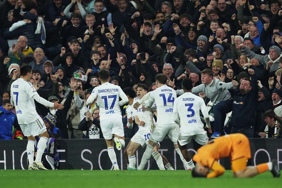 Daniel James of Leeds United celebrates scoring his team's third goal with teammates