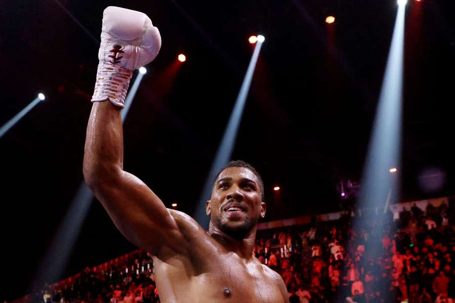 Anthony Joshua celebrates after winning his fight against Otto Wallin