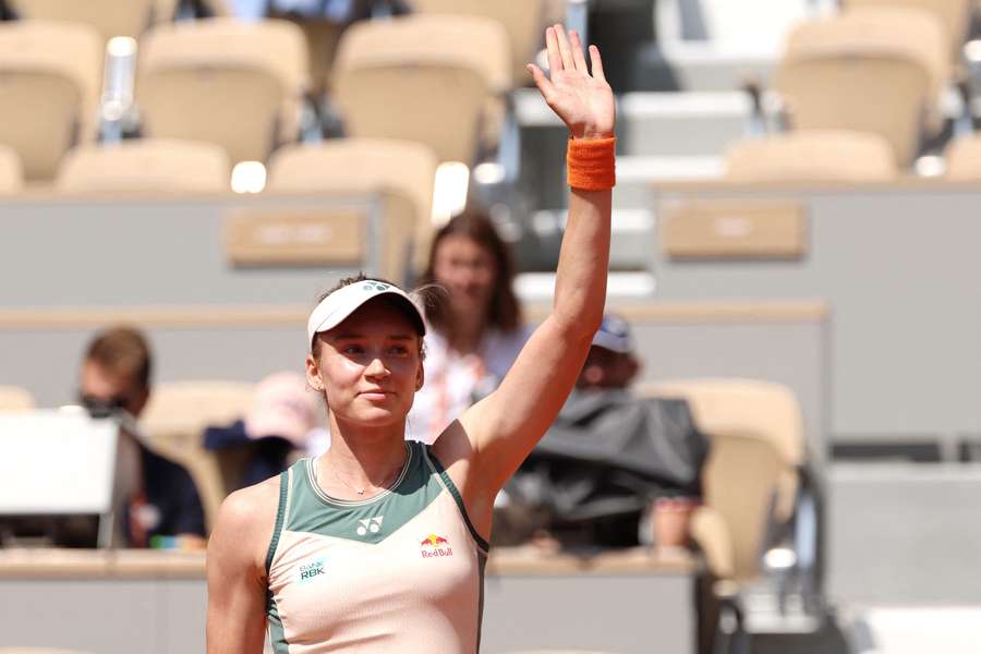 Elena Rybakina celebrates after beating Elina Svitolina