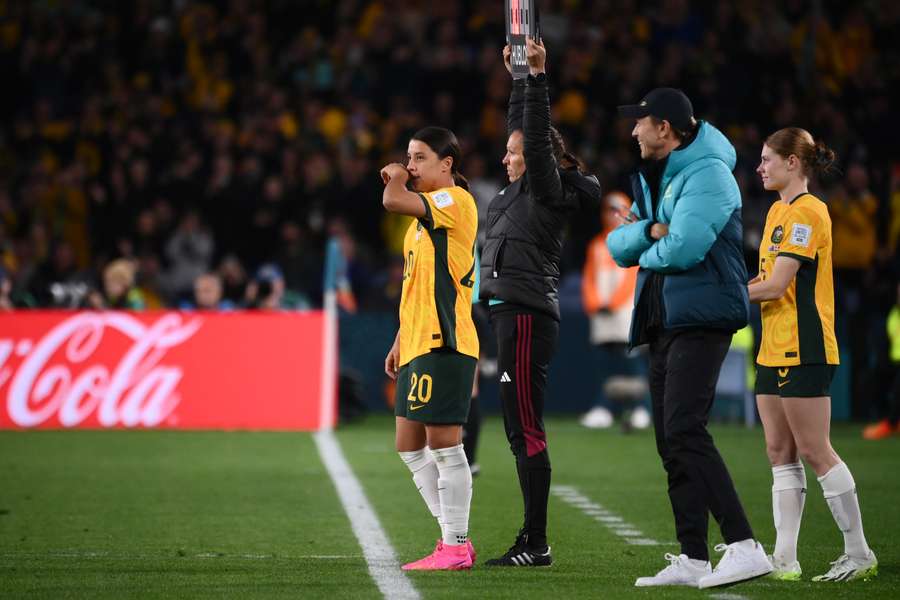 Australia's forward #20 Sam Kerr prepares to enter the field