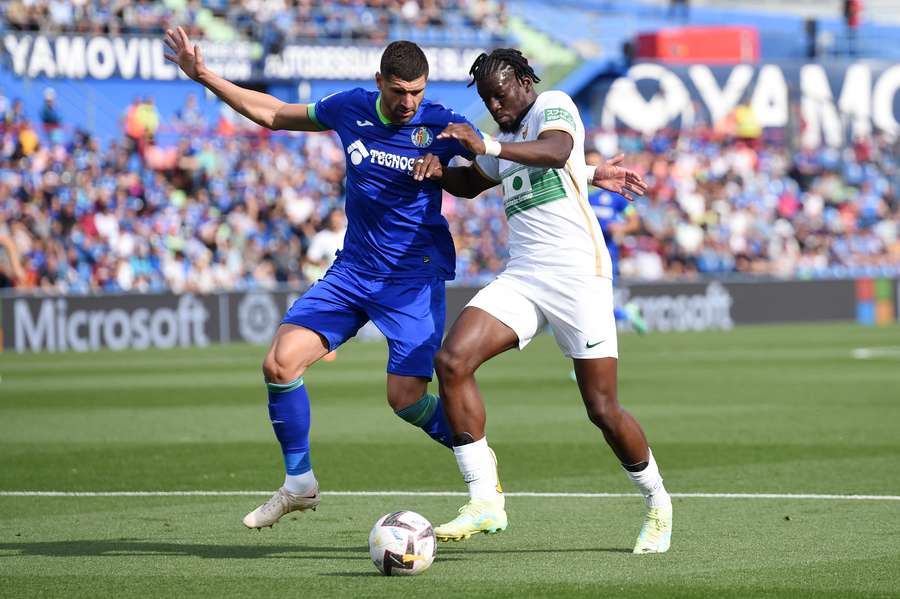 Elche, now relegated, dented Getafe's survival chances in the draw