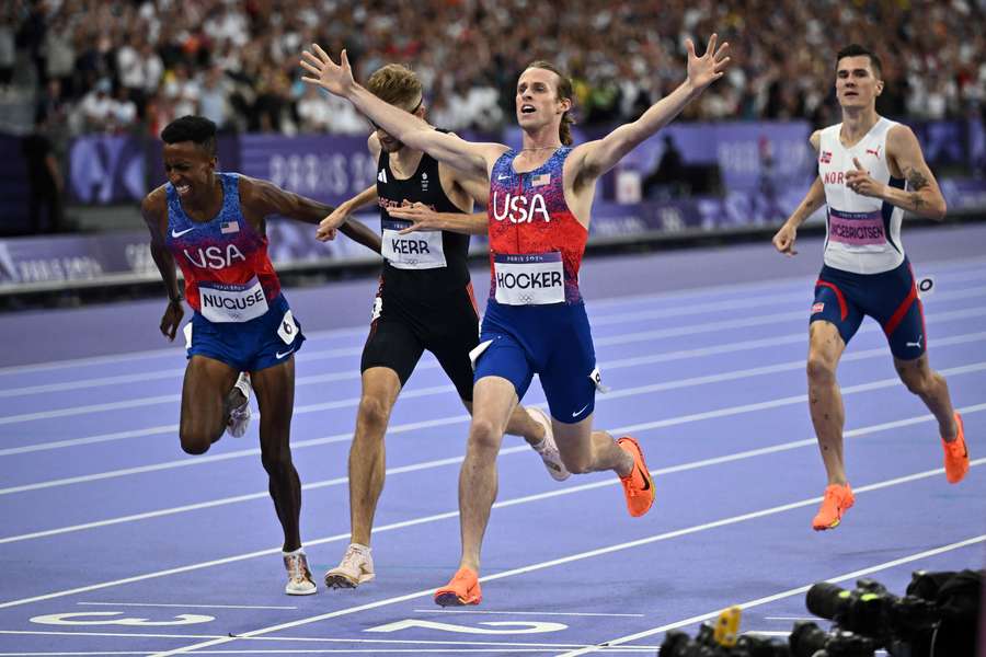 Gold medallist US' Cole Hocker (2nd R) celebrates followed by silver medallist Britain's Josh Kerr (2nd L), bronze medallist US' Yared Nuguse