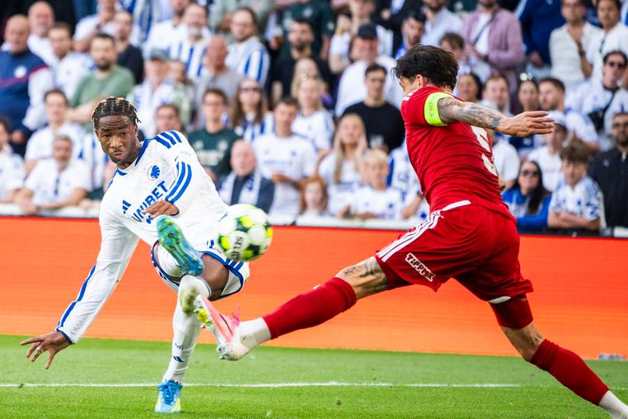 Debrecen's Bence Batik tries to block a shot from FC Copenhagen's Geovanni Vianney Ndjee 