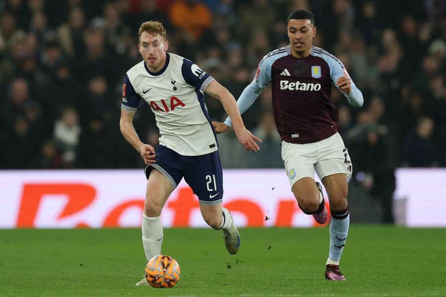 Tottenham Hotspur's Dejan Kulusevski in action with Aston Villa's Morgan Rogers