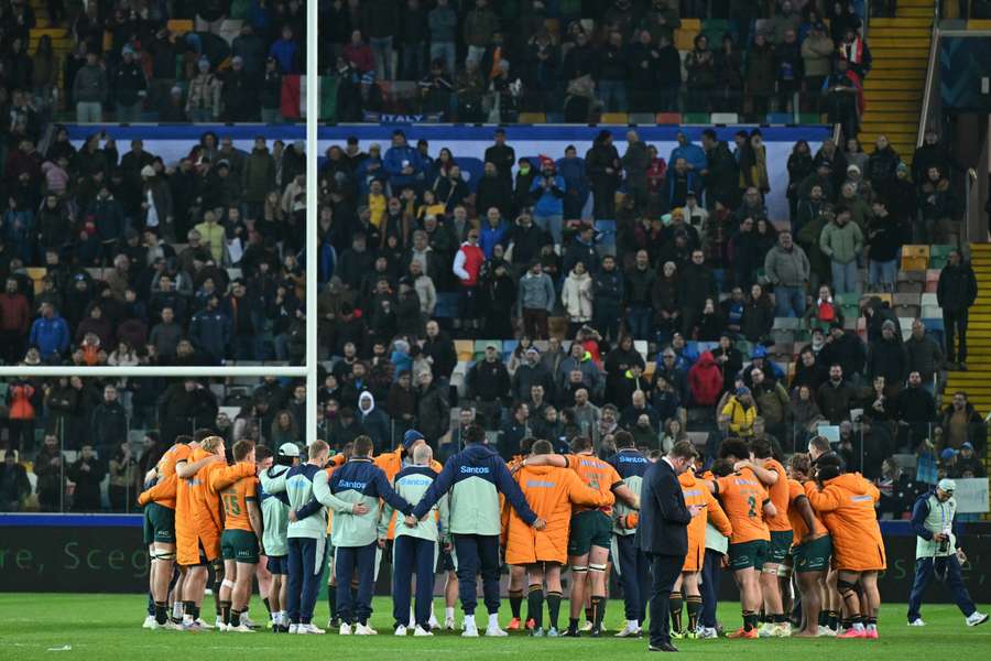 The Wallabies gather to debrief after their shock loss to Italy in Udine this year.
