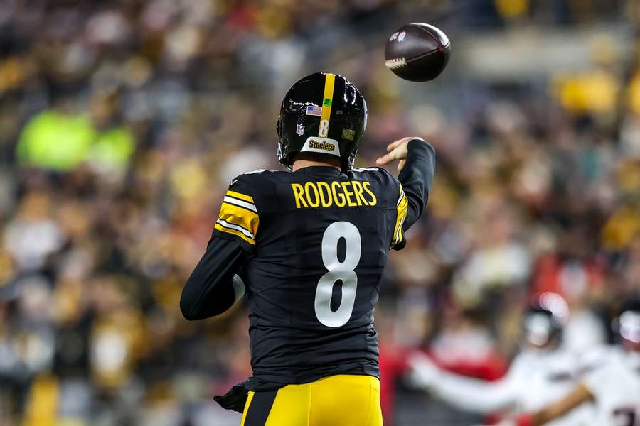 Quarterback Aaron Rodgers throws a pass for the Steelers 