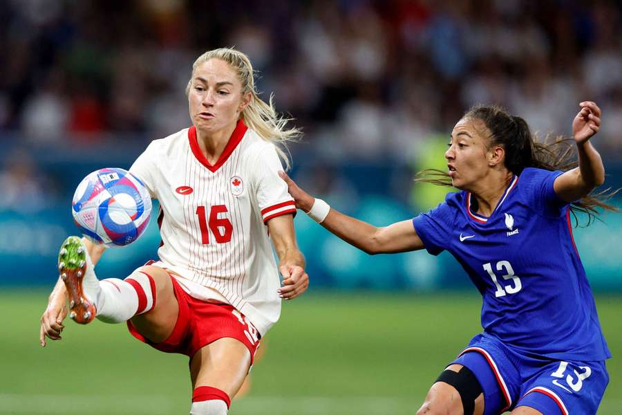 Janine Beckie of Canada in action with Selma Bacha of France