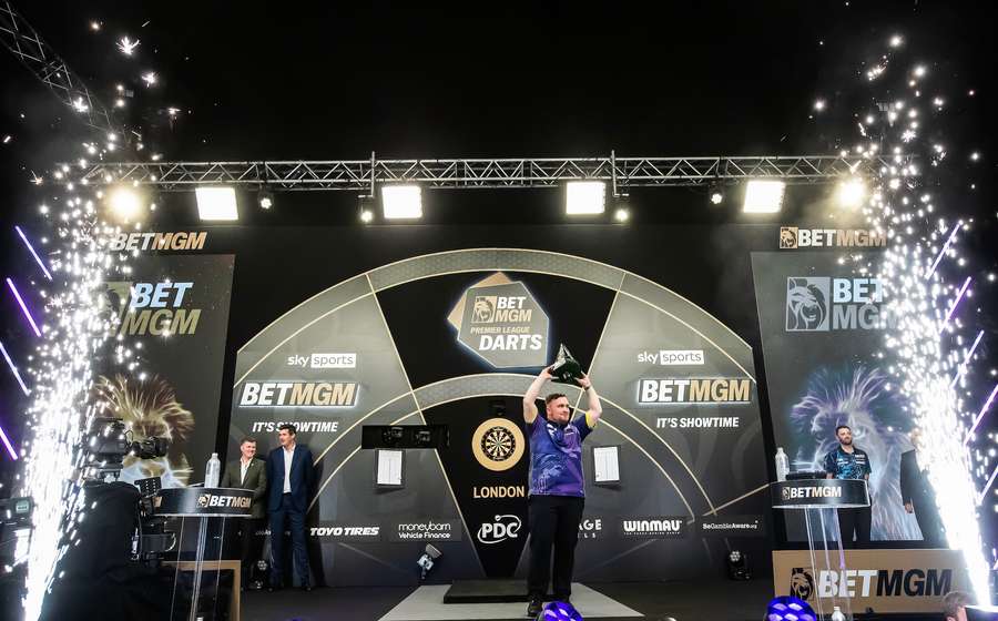 Luke Littler celebrates winning the Premier League Darts 2024