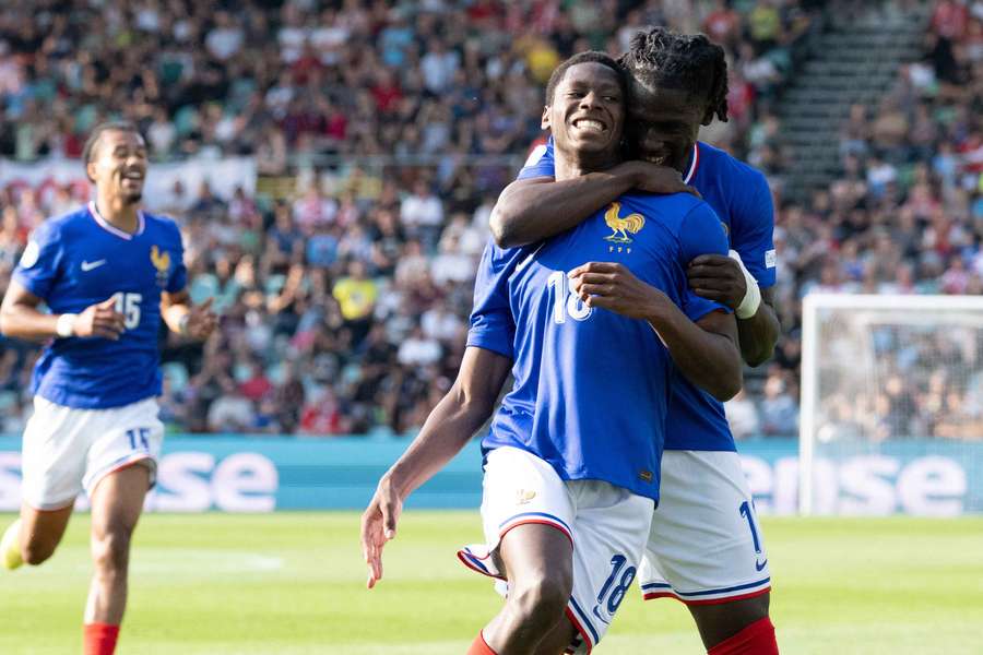 France's Djaoui Cisse celebrates scoring against Poland
