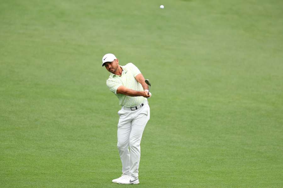 Jason Day of Australia plays a shot