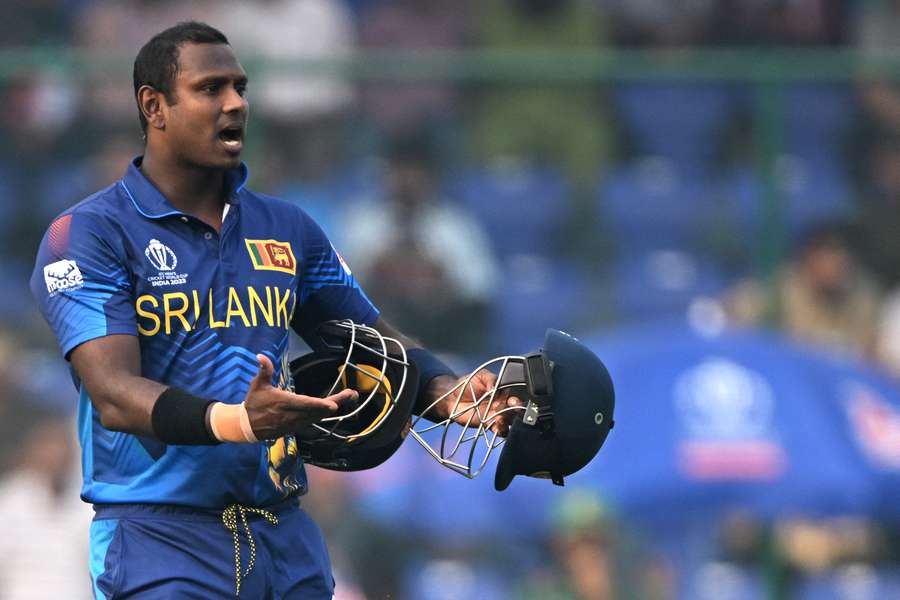 Mathews protests his dismissal