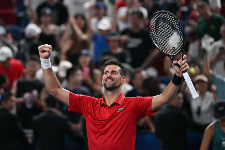 Serbia's Novak Djokovic celebrates after beating Spain's Jaume Munar