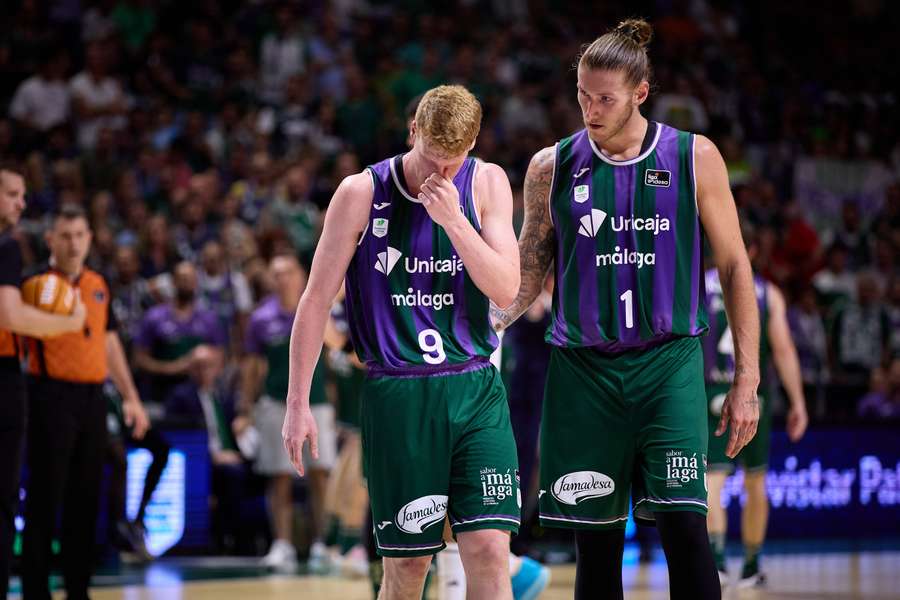 Osetkowski, junto al capitán del Unicaja, Alberto Díaz Osetkowski, junto al capitán del Unicaja, Alberto Díaz