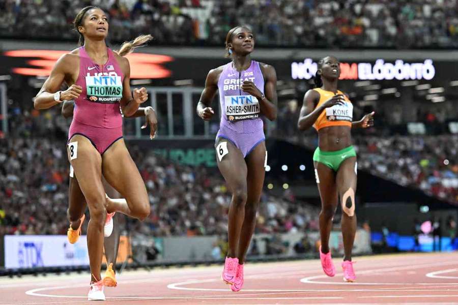 Dina Asher-Smith reacts after qualifying for Friday's 200m final