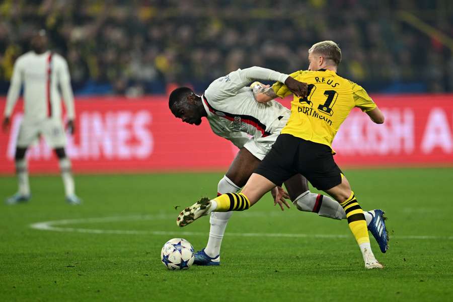 Marco Reus tussling for possession 