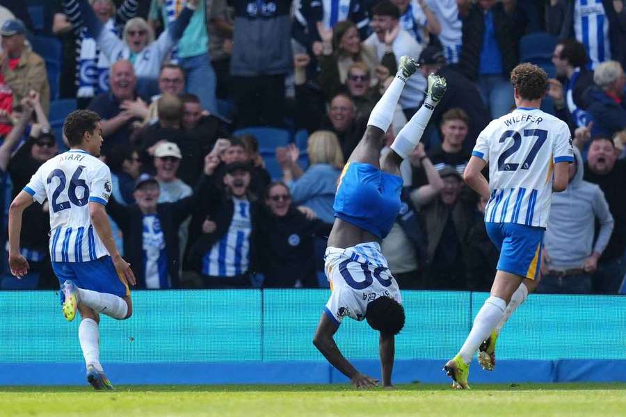 Carlos Baleba celebrates scoring the winning goal in the 92nd minute