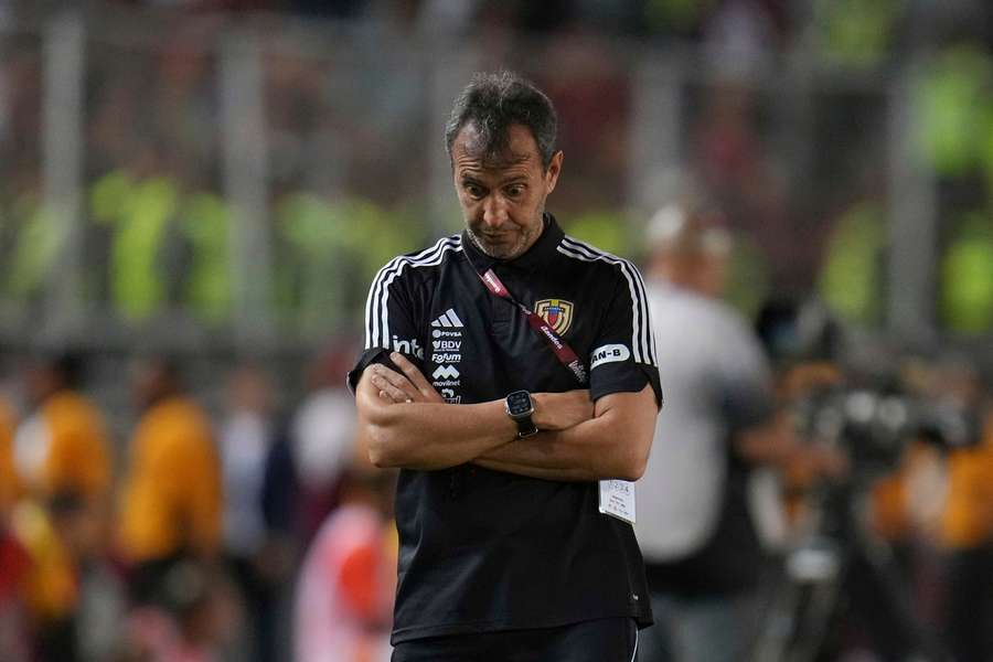 Fernando Batista looks to the floor during Venezuela's World Cup qualifying defeat against Colombia