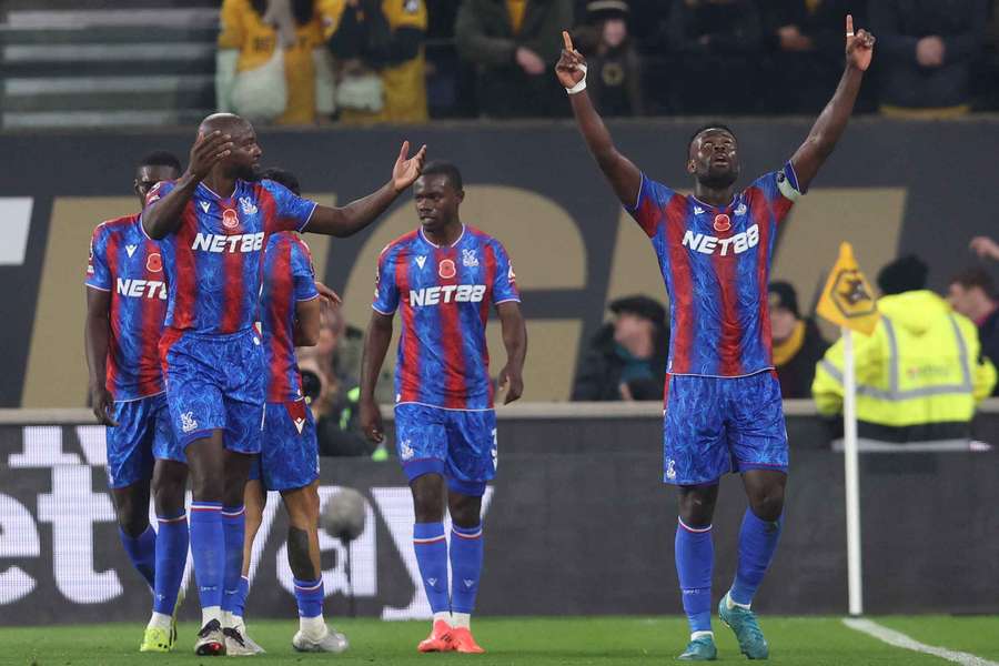 Marc Guehi celebrates scoring Crystal Palace's second goal against Wolves