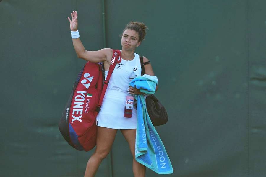 Paolini says goodbye to the crowd after her defeat
