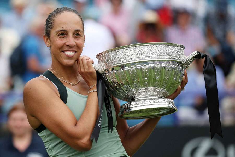 Madison Keys poses for a photograph with her trophy after winning the final against Tatjana Maria