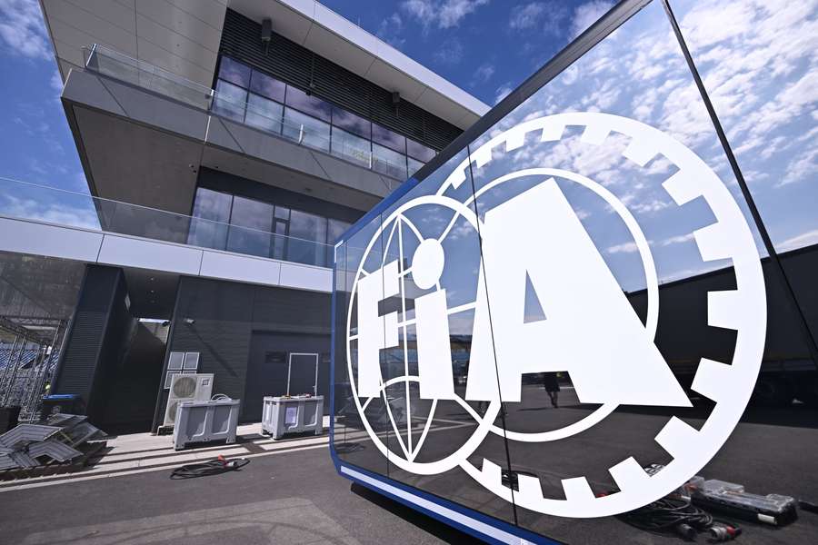 The logo of FIA is seen with the Hungaroring's new main building