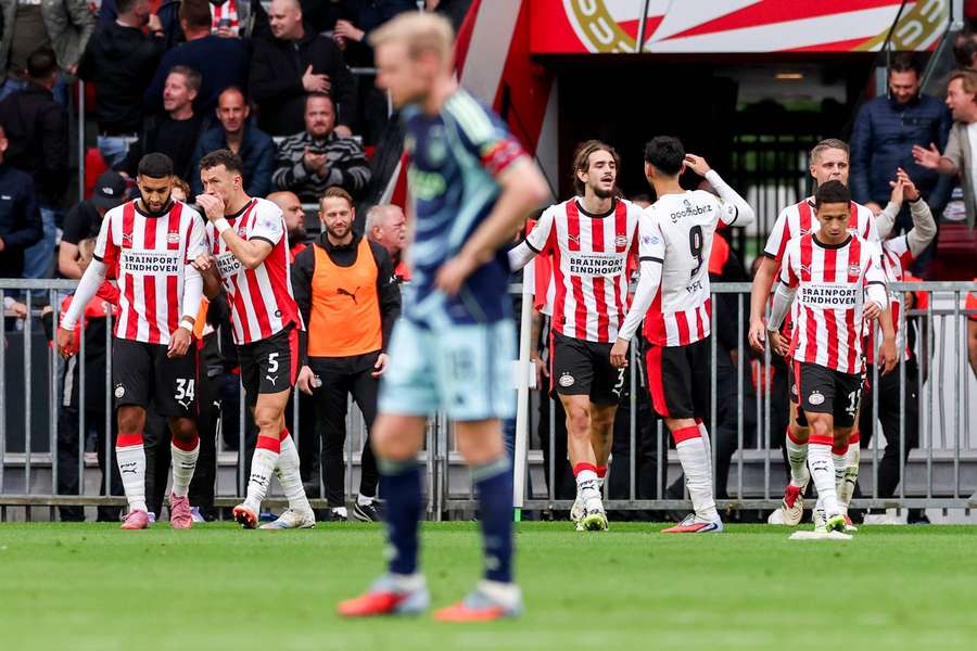 PSV celebrate Yarek Gasiorowski's (#3) goal as Ajax captain Davy Klaassen sulks