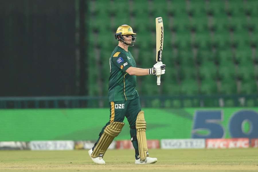 Steve Smith acknowledges his half-century overnight.