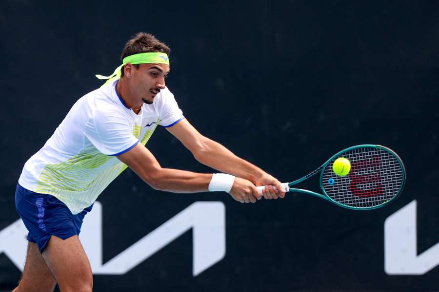 Lorenzo Sonego returns a serve during Tuesday's first round Australian Open win.