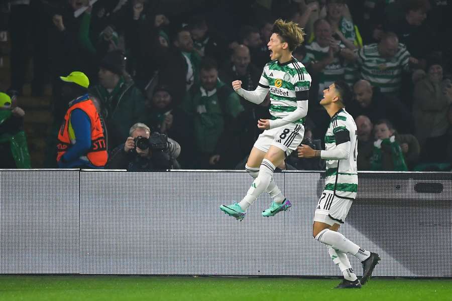 Kyogo Furuhashi (L) celebrates after scoring the opener