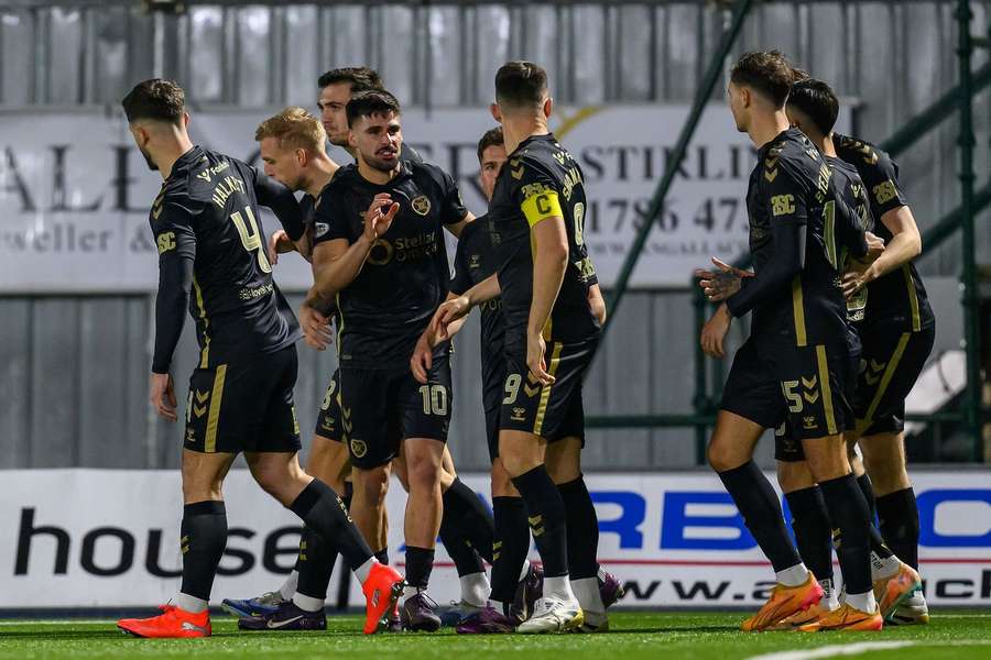 Claudio Braga of Hearts celebrates with his teammates after scoring the opener Claudio Braga of Hearts celebrates with his teammates after scoring the opener