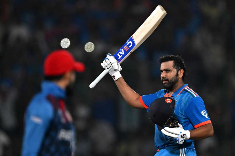 India captain Rohit Sharma celebrates after scoring a century