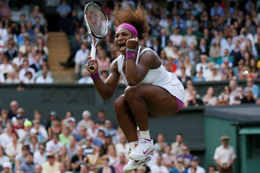 Serena Williams celebrates after defeating Zheng Jie in their women's singles match at Wimbledon in 2012 Serena Williams celebrates after defeating Zheng Jie in their women's singles match at Wimbledon in 2012