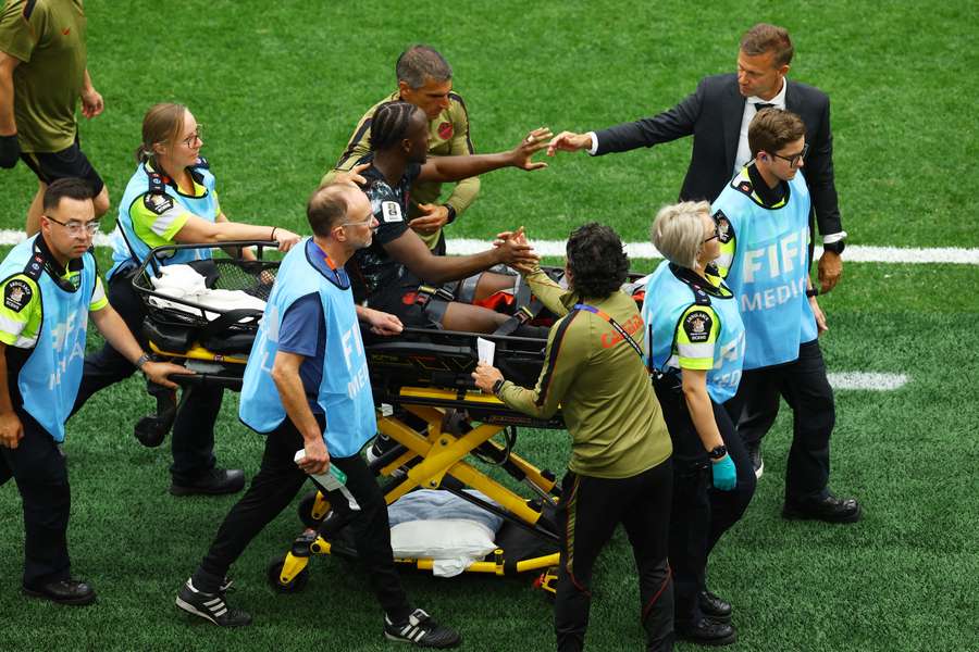 Ismael Kone is taken off the field on a stretcher Ismael Kone is taken off the field on a stretcher