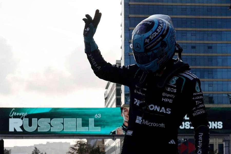 George Russell celebrates after qualifying in pole position in Baku George Russell celebrates after qualifying in pole position in Baku