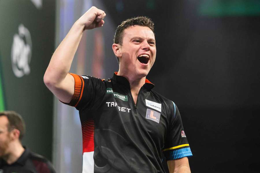 Jeffrey De Graaf celebrates after beating Gary Anderson in front of a stunned Alexandra Palace