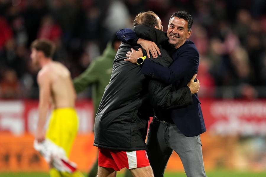 Girona manager Míchel embraces Daley Blind after their LaLiga win over Villarreal