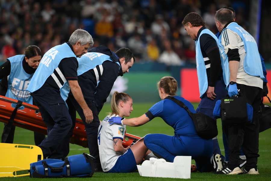 England midfielder Keira Walsh receives medical attention before leaving the pitch on a stretcher