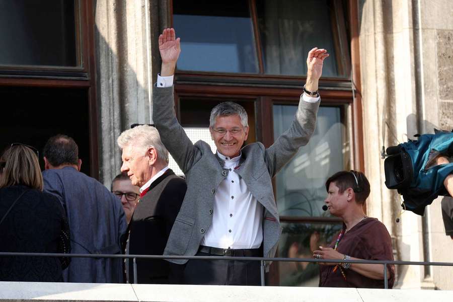 Bayern Munich president Herbert Hainer celebrates after winning the Bundesliga