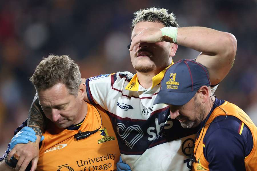 A distressed Caleb Tangitau leaves the field with injury on Friday evening. A distressed Caleb Tangitau leaves the field with injury on Friday evening.