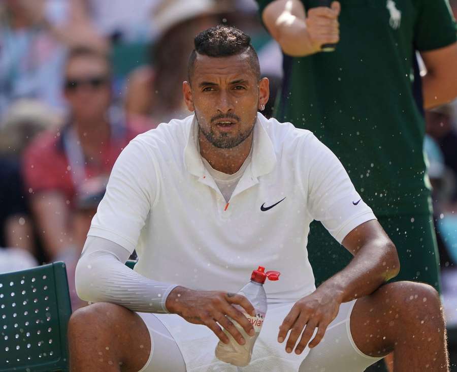 Nick Kyrgios covered his right arm against Rafael Nadal at Wimbledon in 2019