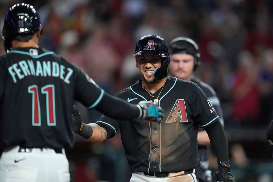 Ildemaro Vargas celebrates home run against White Sox