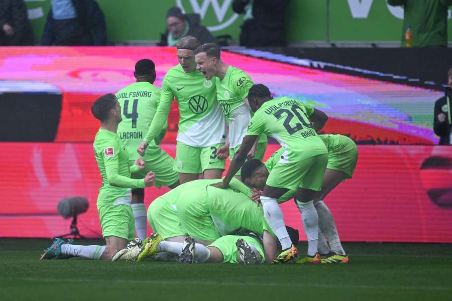 Wolfsburg celebrate the only goal of the game