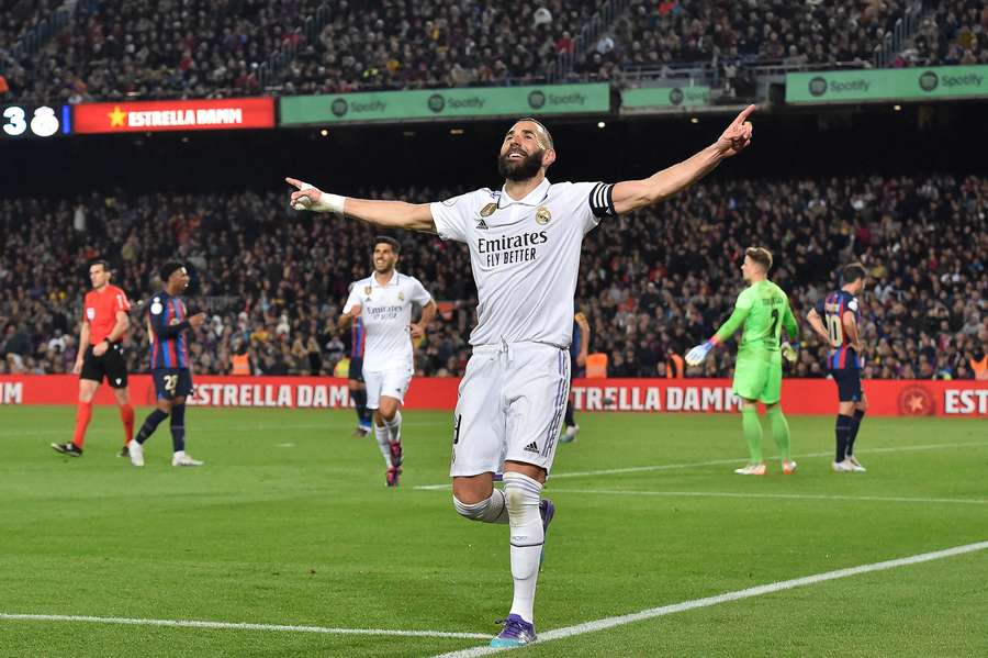 Benzema celebrates scoring the opening goal against Chelsea