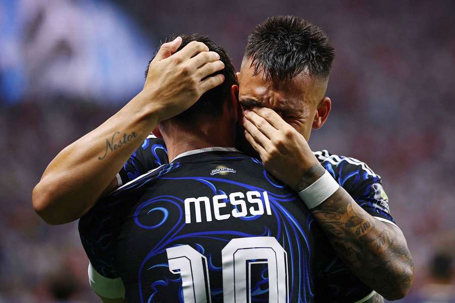 Argentina's Lautaro Martinez celebrates scoring their second goal with Lionel Messi Argentina's Lautaro Martinez celebrates scoring their second goal with Lionel Messi